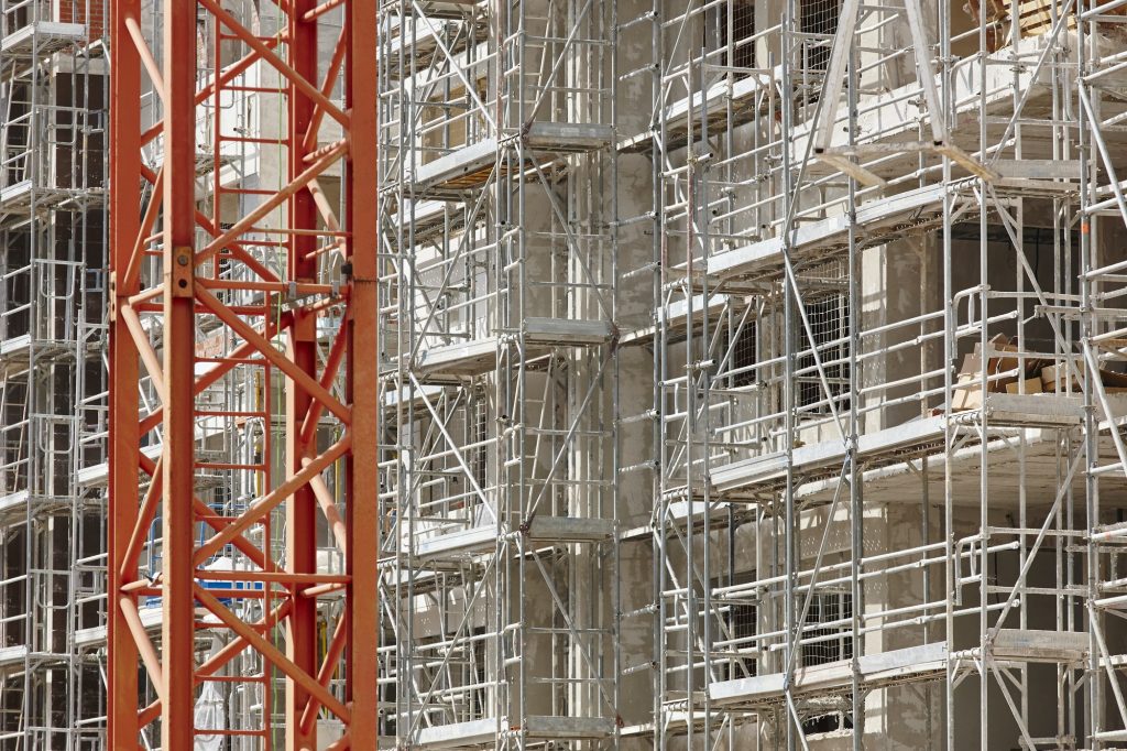 Scaffolding structure on a building. Construction architecture industry. Workplace